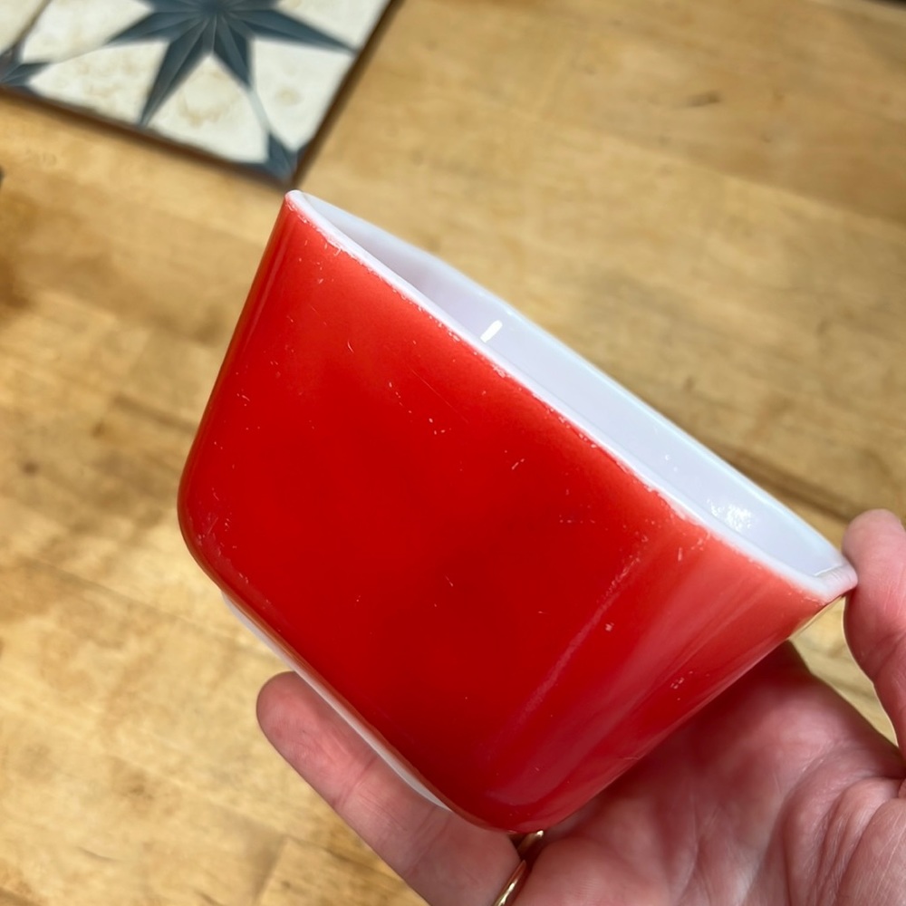 Small red Pyrex fridge keeper